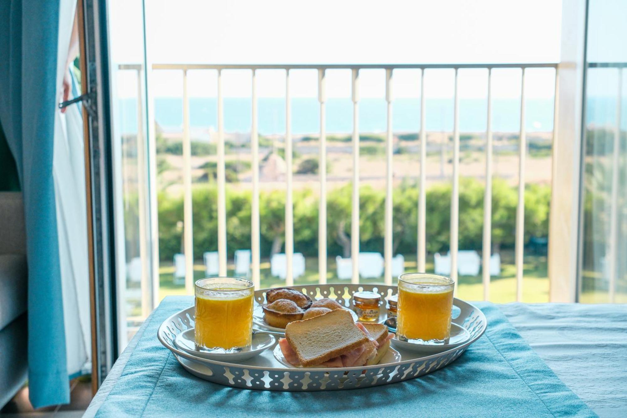Hotel Scoglio Degli Achei Torre Santa Sabina Kültér fotó